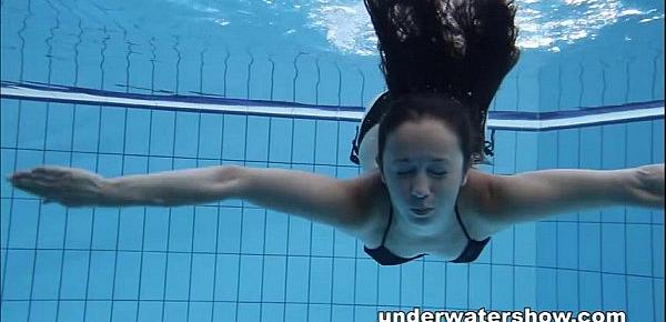  Cute Umora is swimming nude in the pool